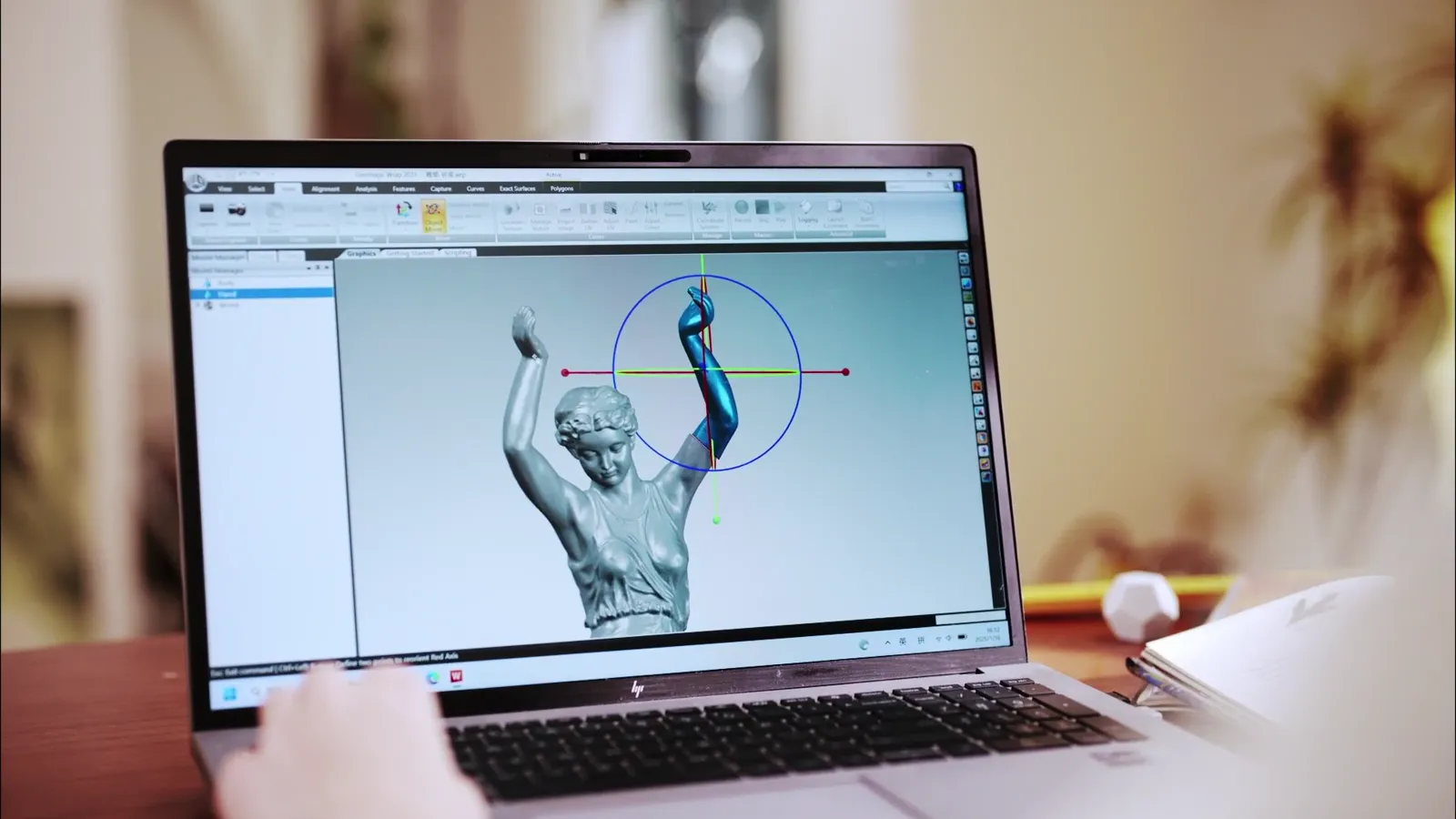 Modelo 3D de uma estátua aberto no software